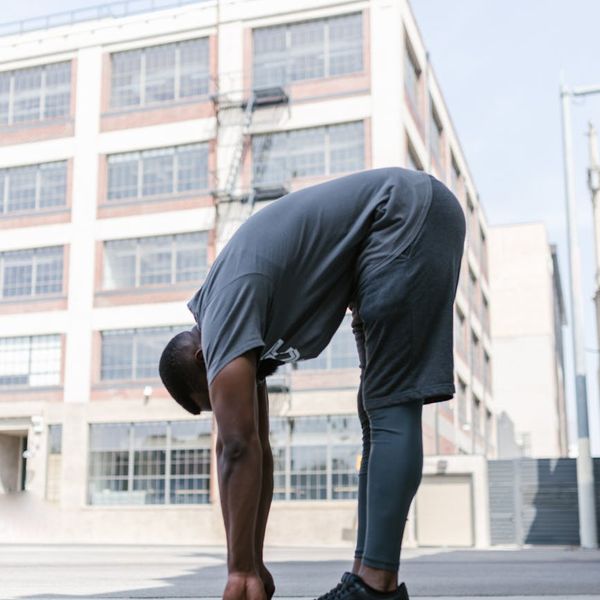 Man in a state of balance and concentration during an exercise routine.